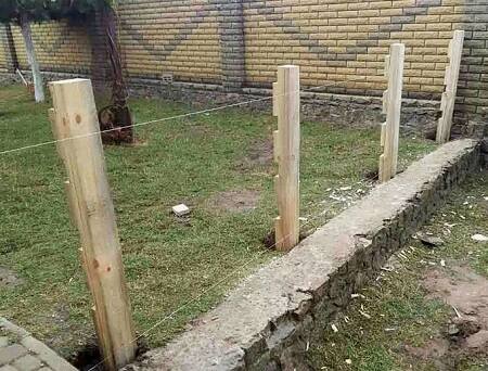 Бутование столбов - деревянные столбы